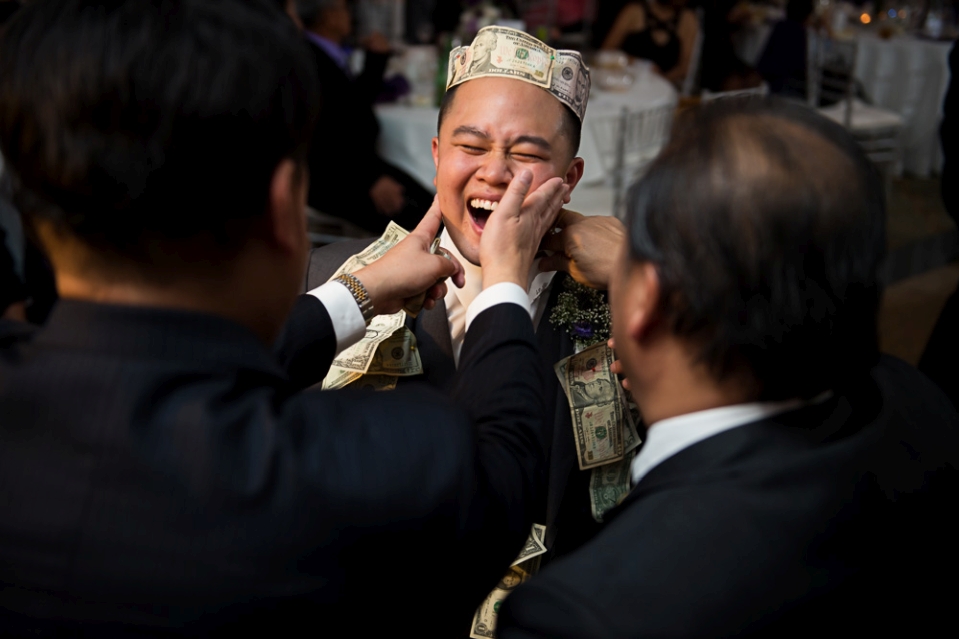 Groom reacts to wedding games.